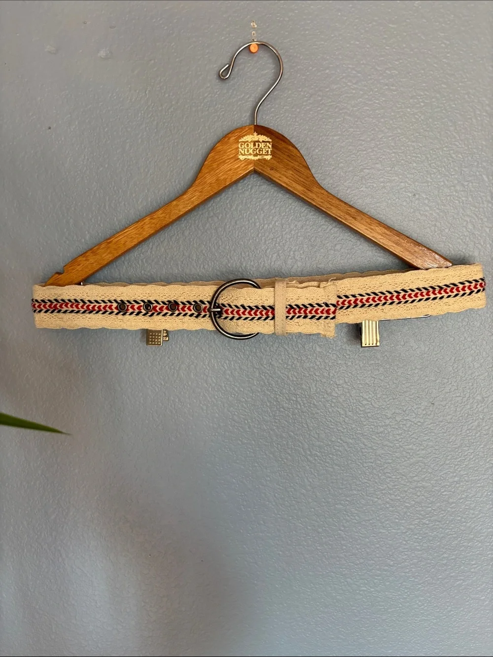 Canvas cream color crochet belt with red and blue embroidered accents. Size 7